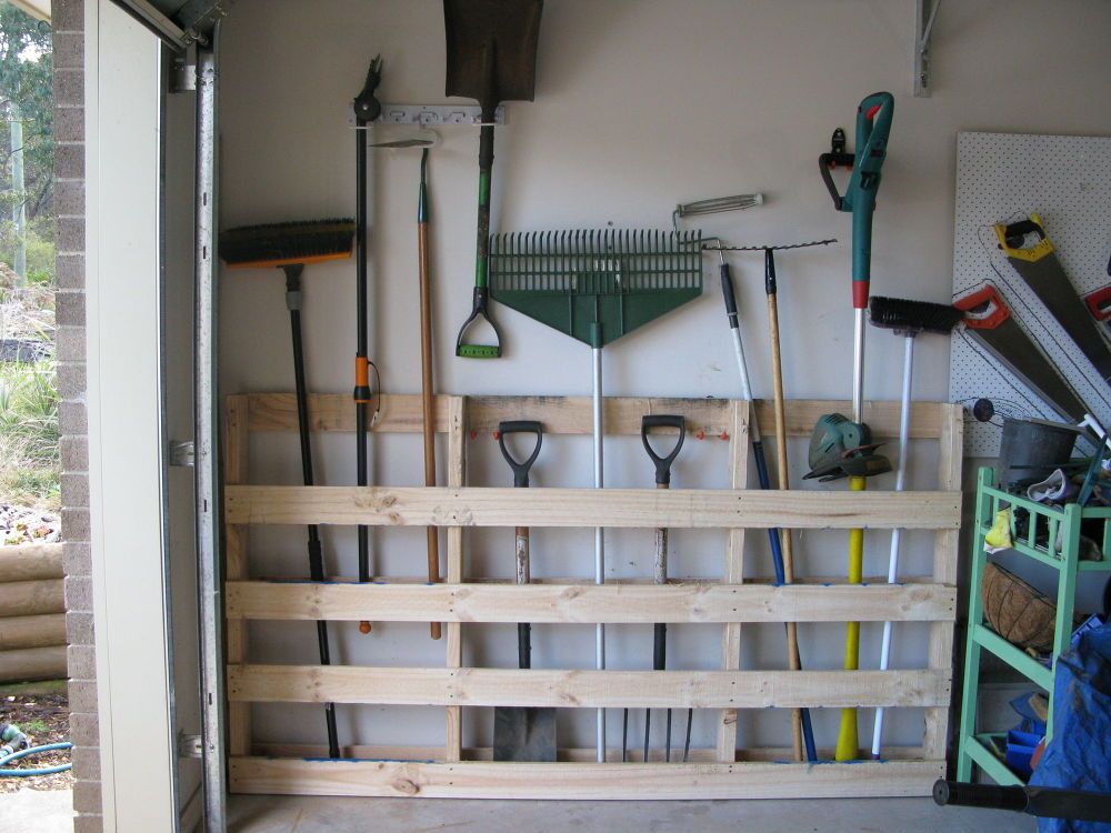 Tip #1 To Organize Your Garage: Re-use pallets to create a storage system