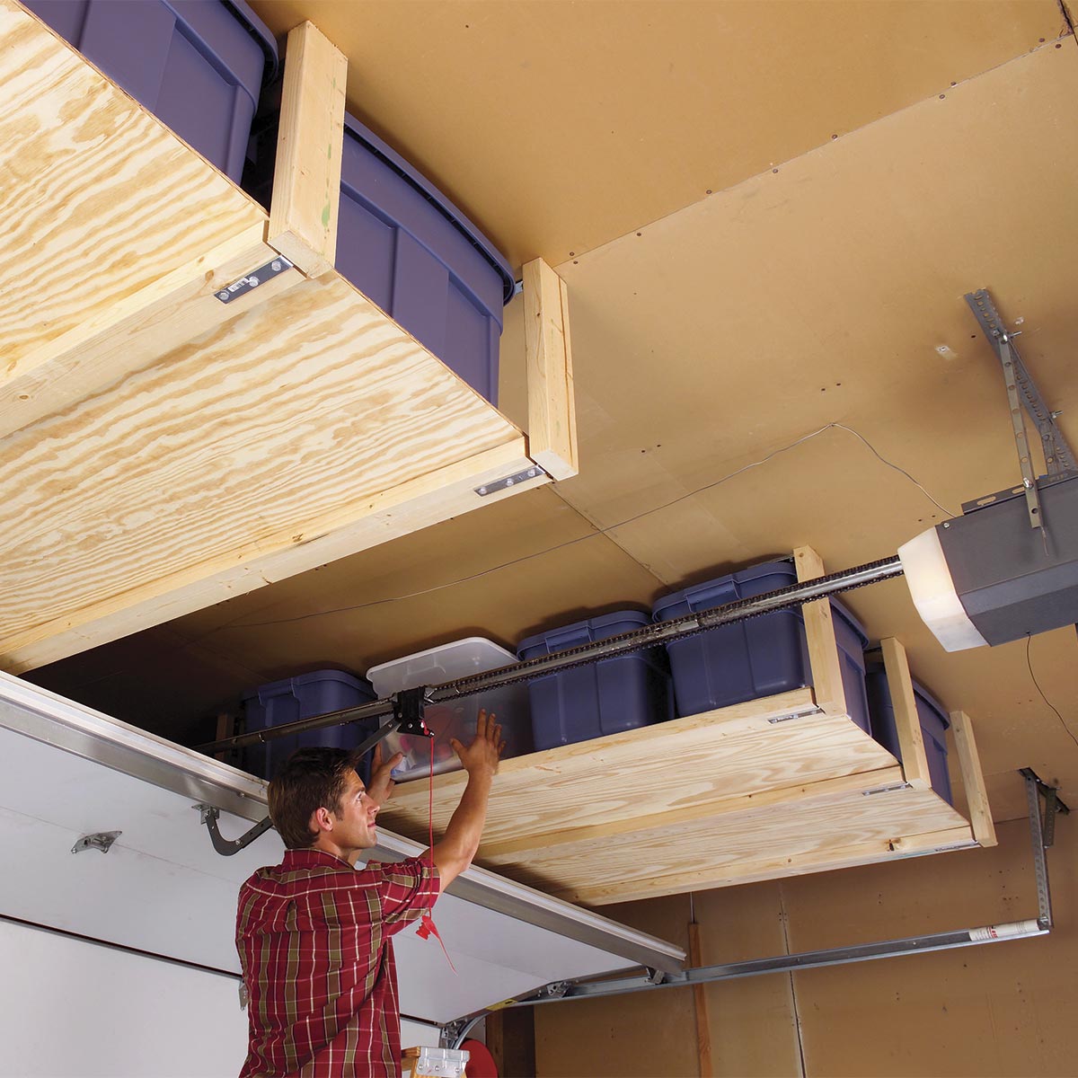 Tip #3 To Organize Your Garage: Use plywood ceiling shelves